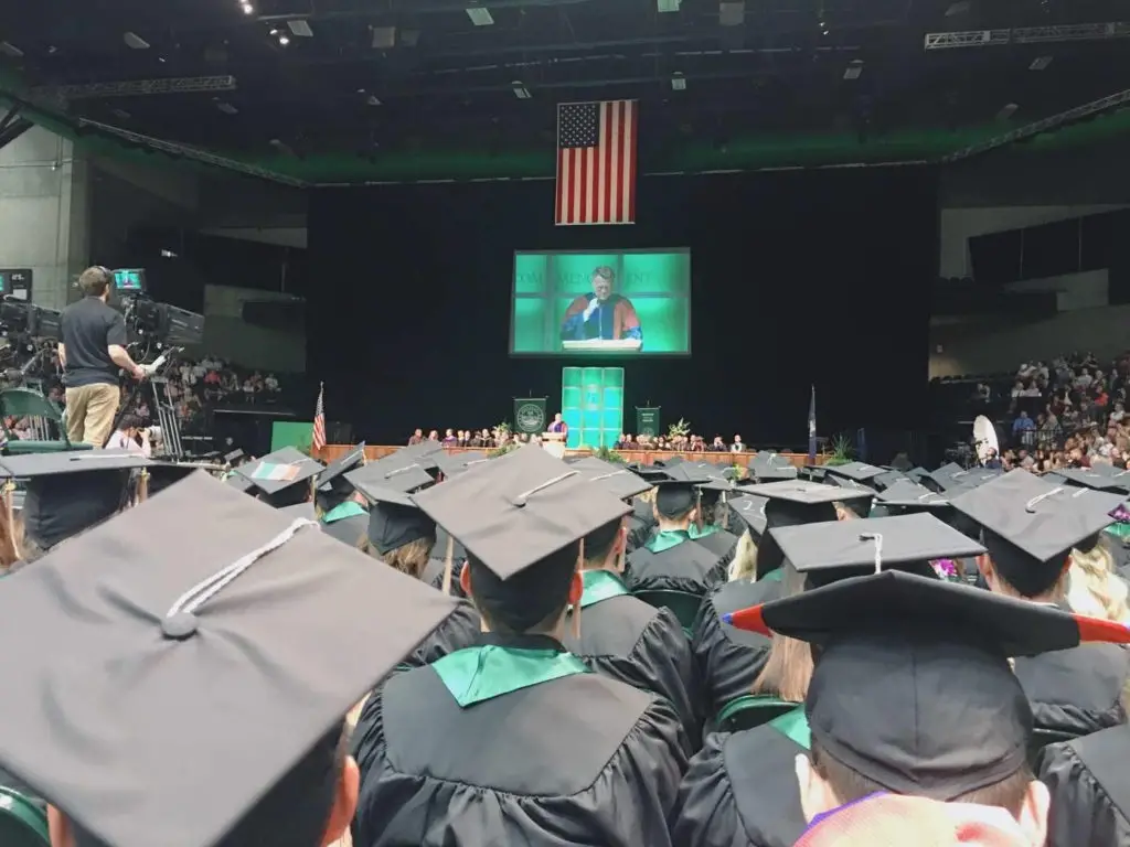 My gradutation ceremony at Utah Valley University with many students wearing graduation cap and gowns. 