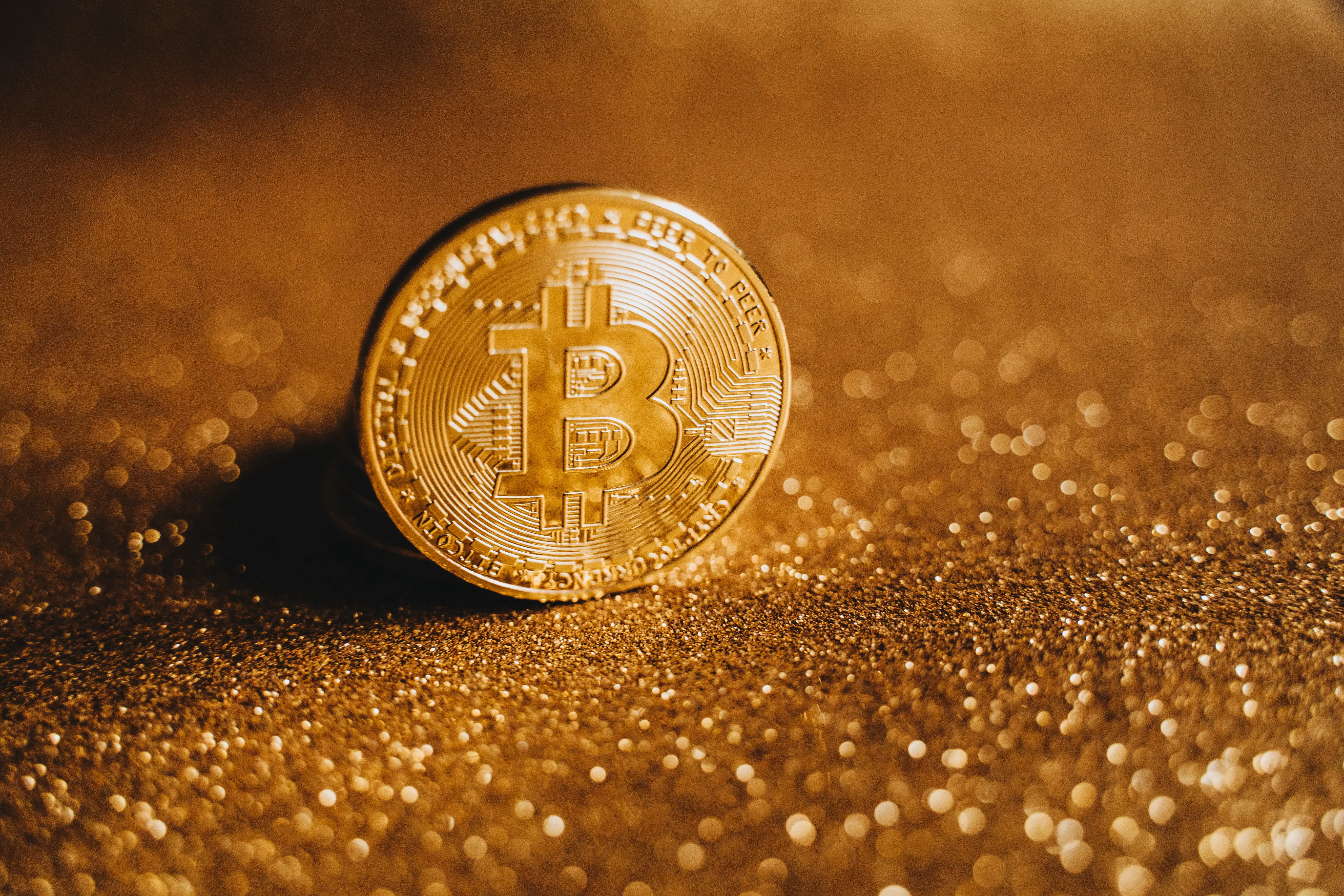 Bitcoin with a gold background