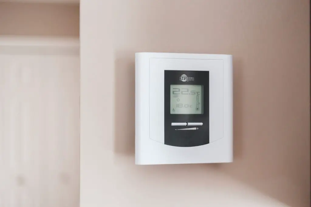 programmable thermostate to help lower your electric bill
