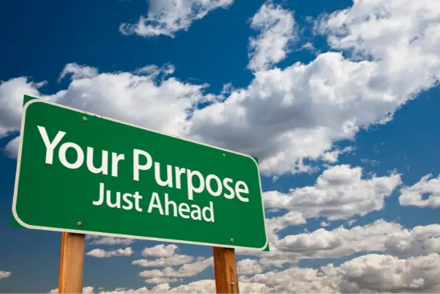 Sign saying Your Purpose Just Ahead