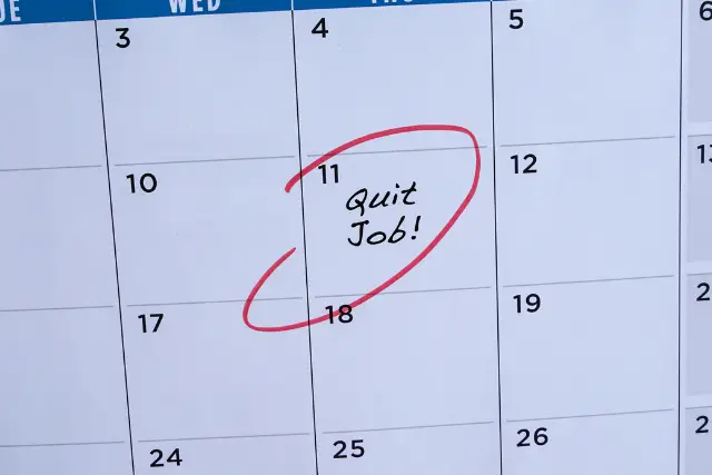Calender that has the word "quit job" circled on a certain day