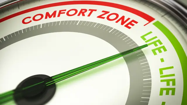 Speedometer showing comfort zone on one end and living life on the other end. A salaried job can keep you in the comfort zone.