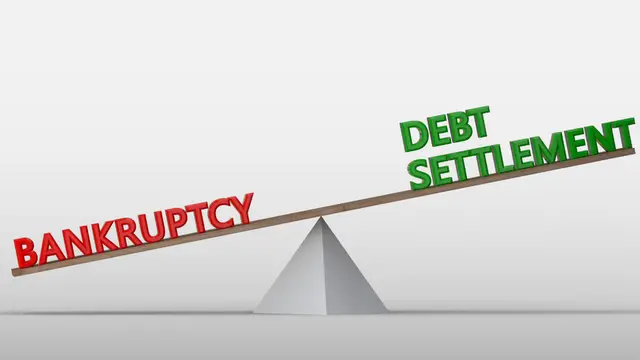 Debt settlement and bankruptcy on two sides of a scale with debt settlement higher as the better option