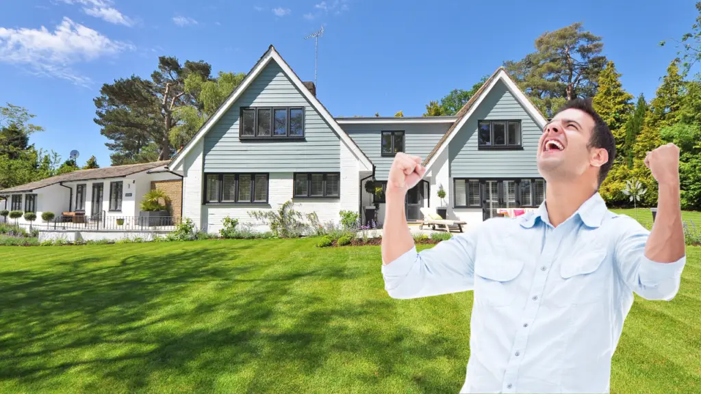 Person who won a house bidding war and is excited outside in front of the new home. 
