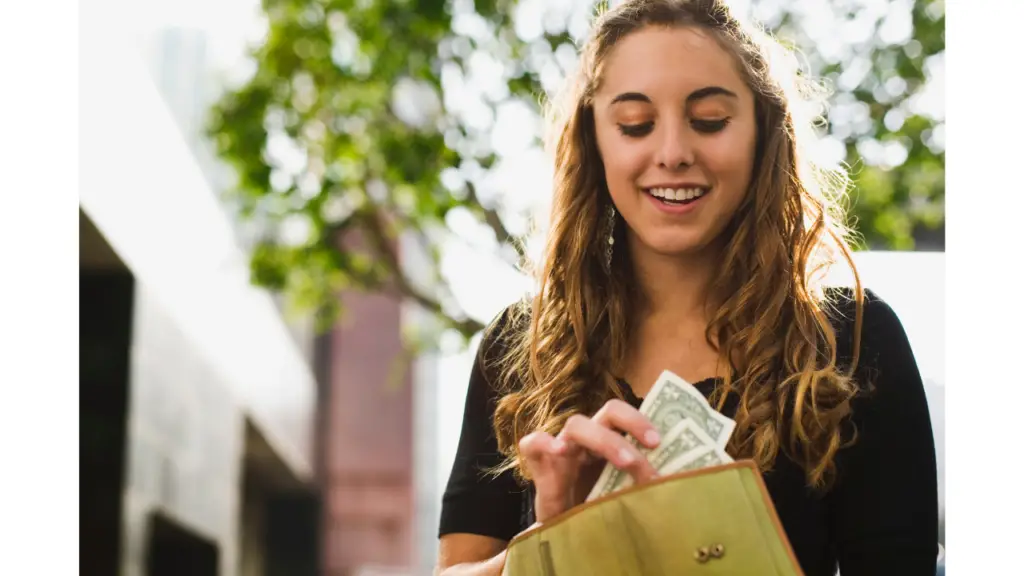 Teenager with a wallet from money she earned