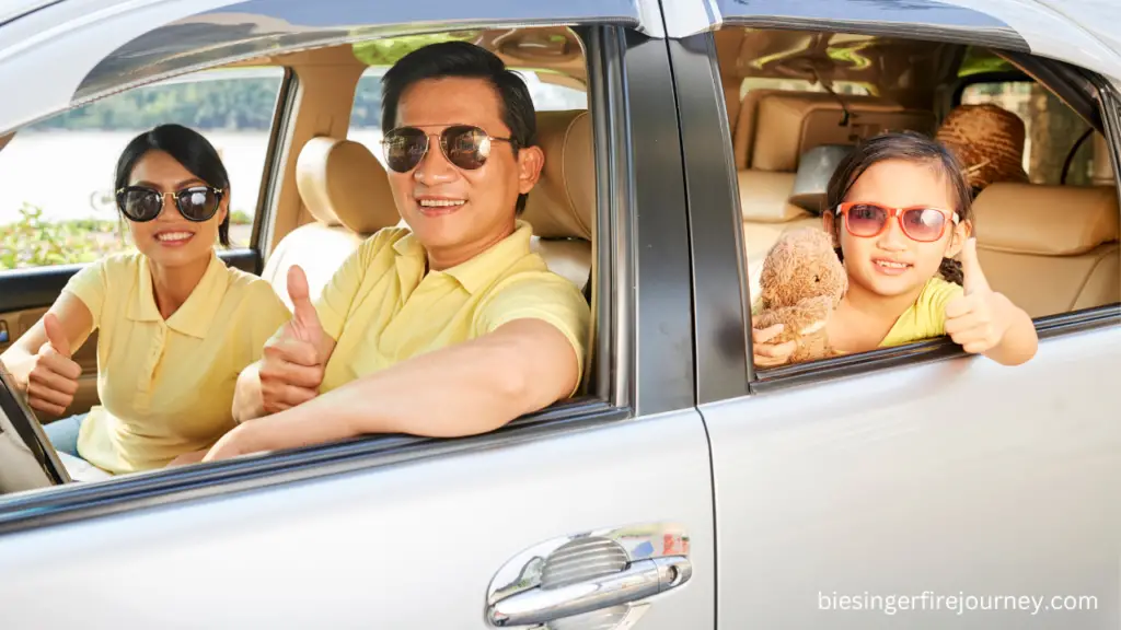 Happy family in a car that just purchased their car with cash
