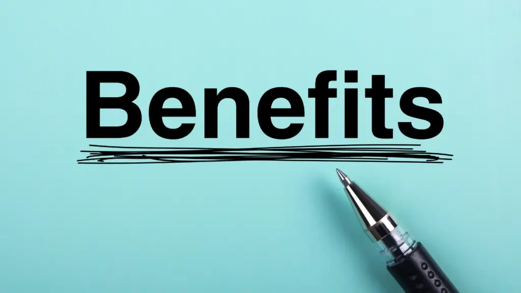 The word "Benefits" underlined in ink and a pen