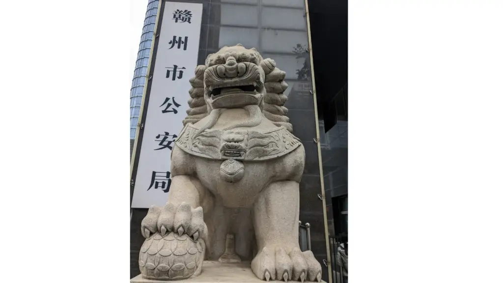 A lion statue in China outside of the exit/entry administration of public security building